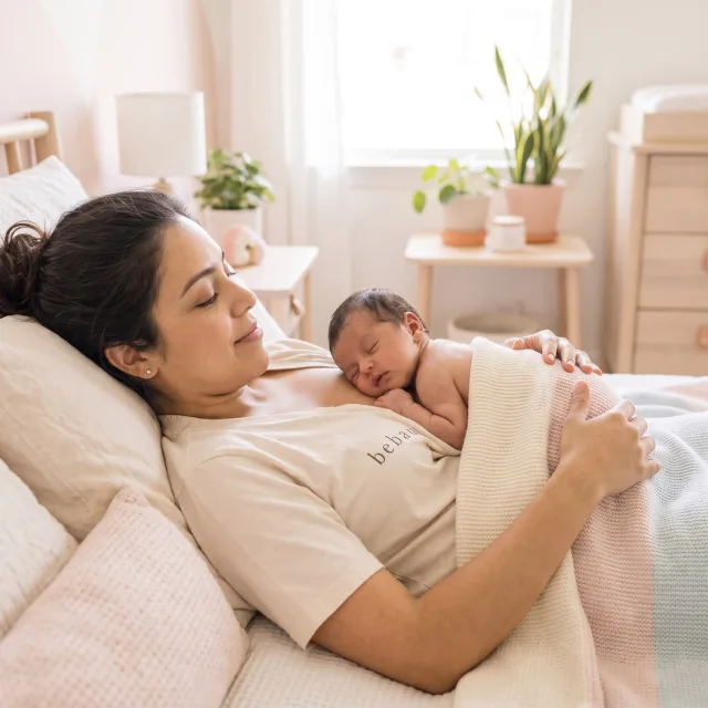 A mother holding her newborn skin to skin